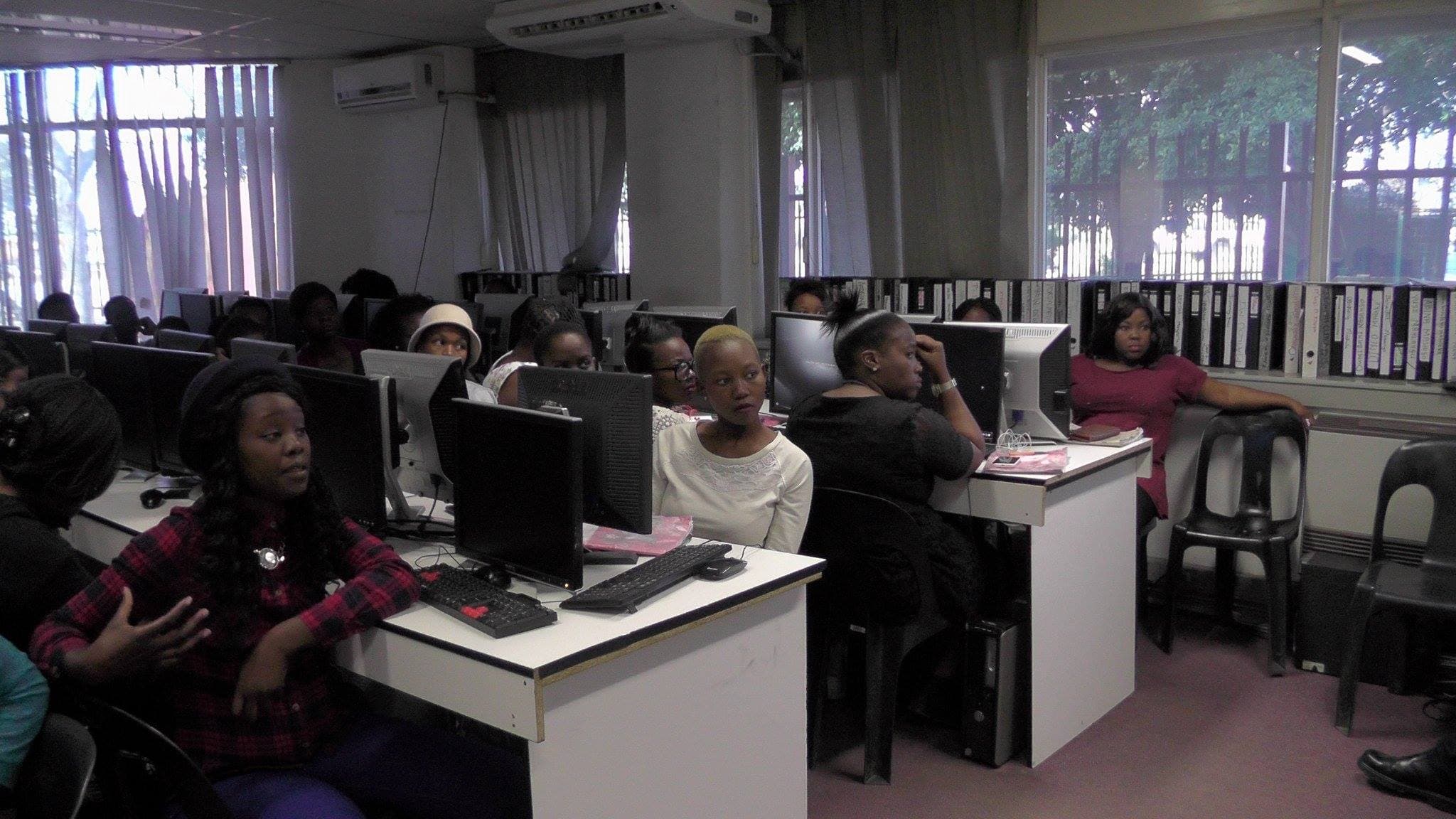 Learners taking part in a hands-on digital and skills training session
