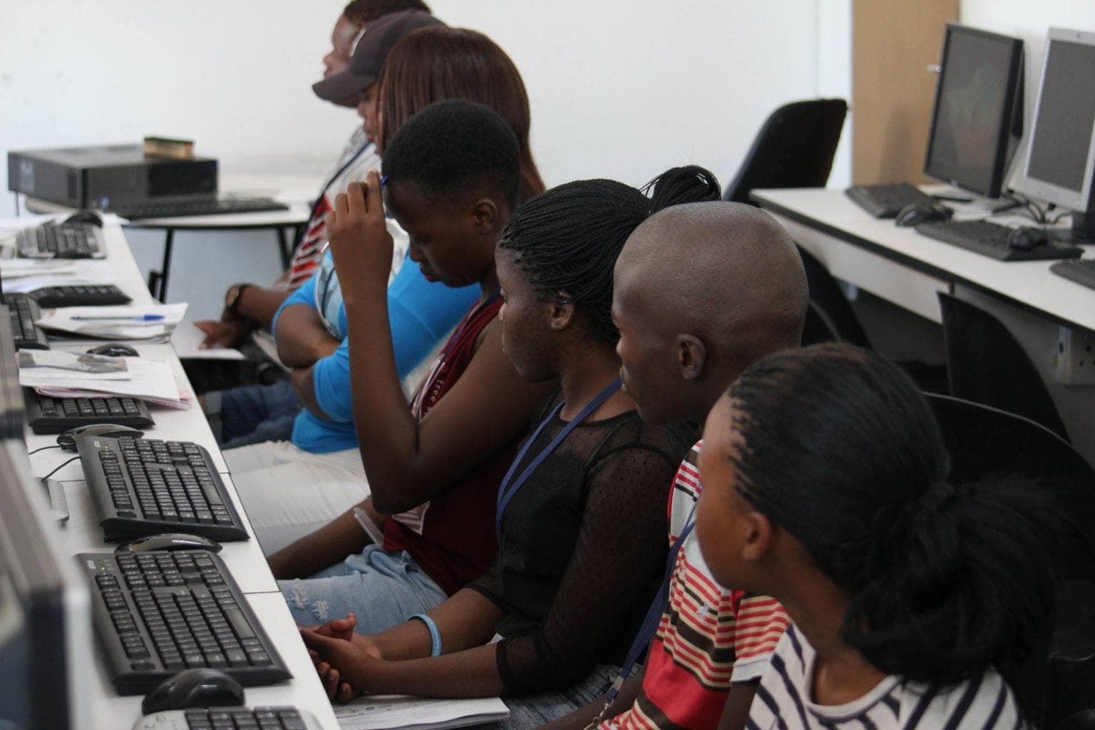 Participants building practical capability in a structured programme environment