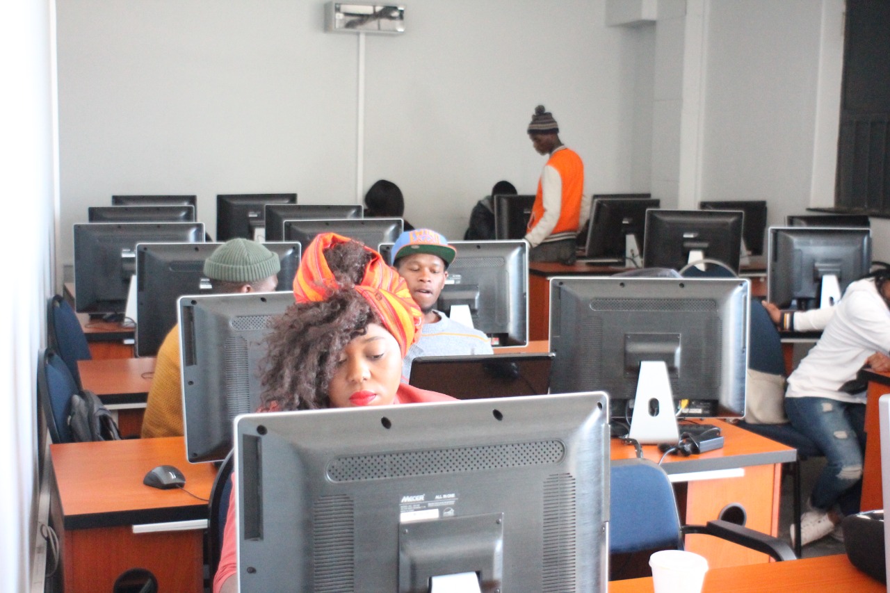 Participants learning practical technology and digital skills